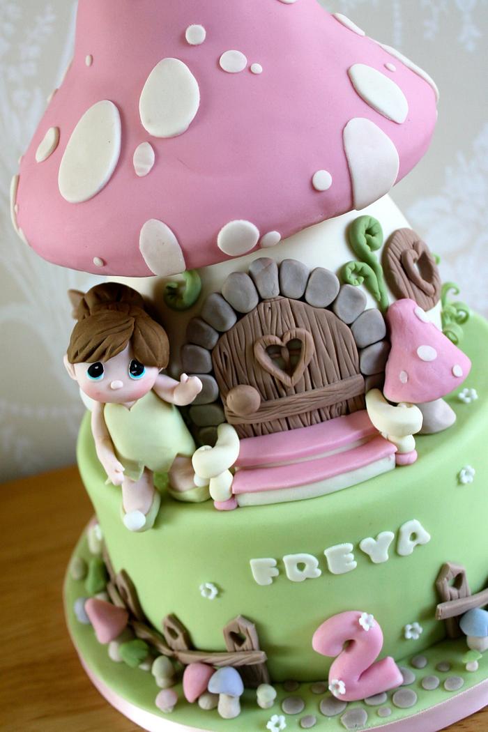 Toadstool house with fairy