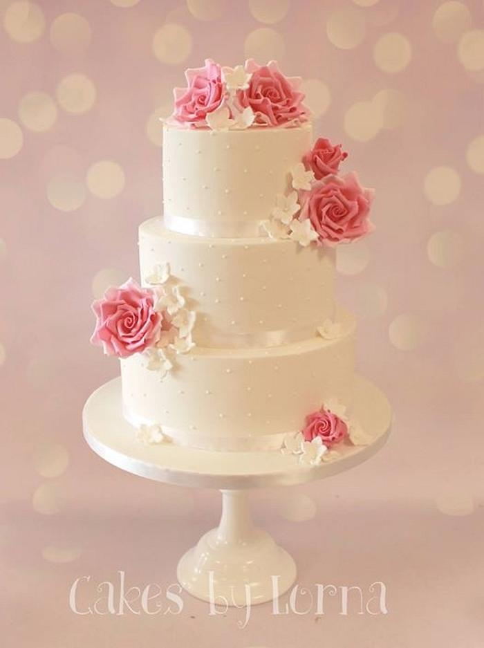 Three tier rose wedding cake