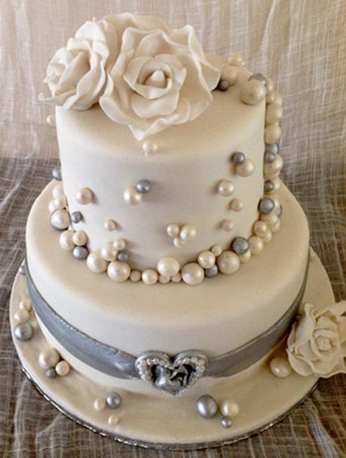 wedding cake with bubbles and fondant roses