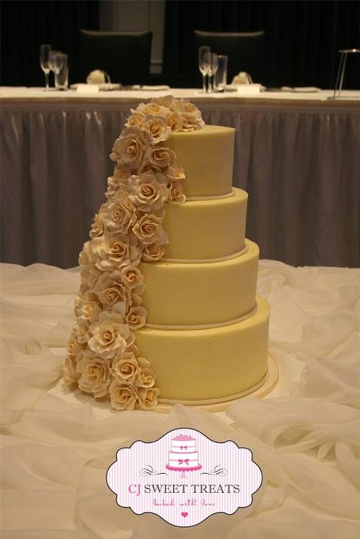 Buttercream Beauty with cascading roses