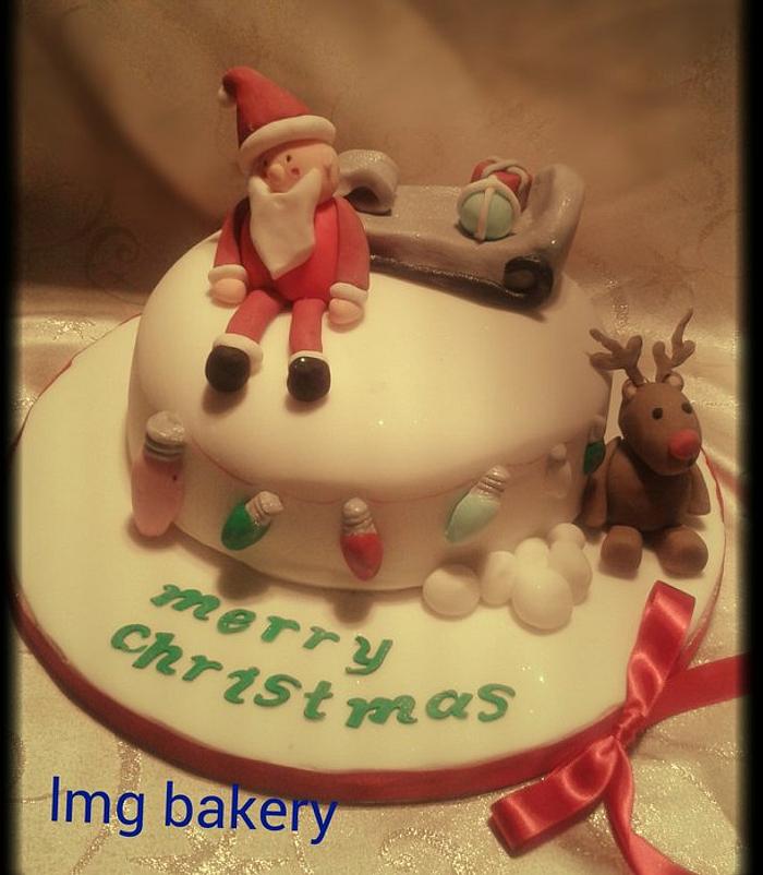 santa and rudolf Christmas cake