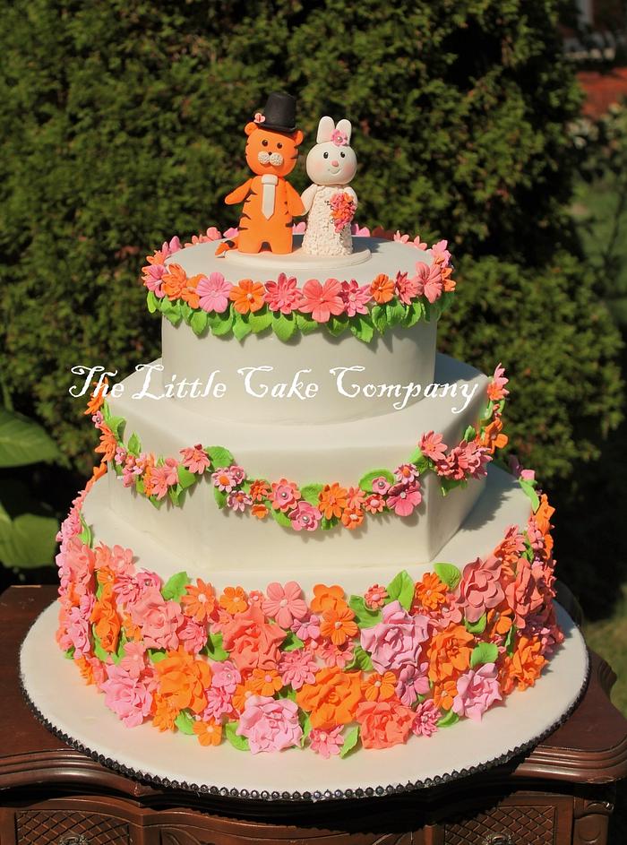 pink, coral and orange wedding cake