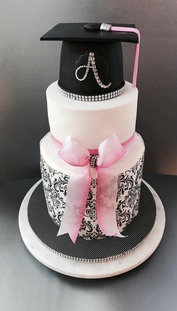 Pink and black graduation cake