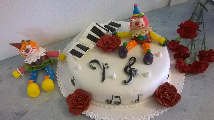 Carnival birthday cake  for a piano player