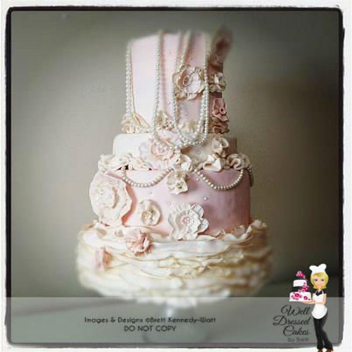 Vintage pearl and ruffle wedding cake