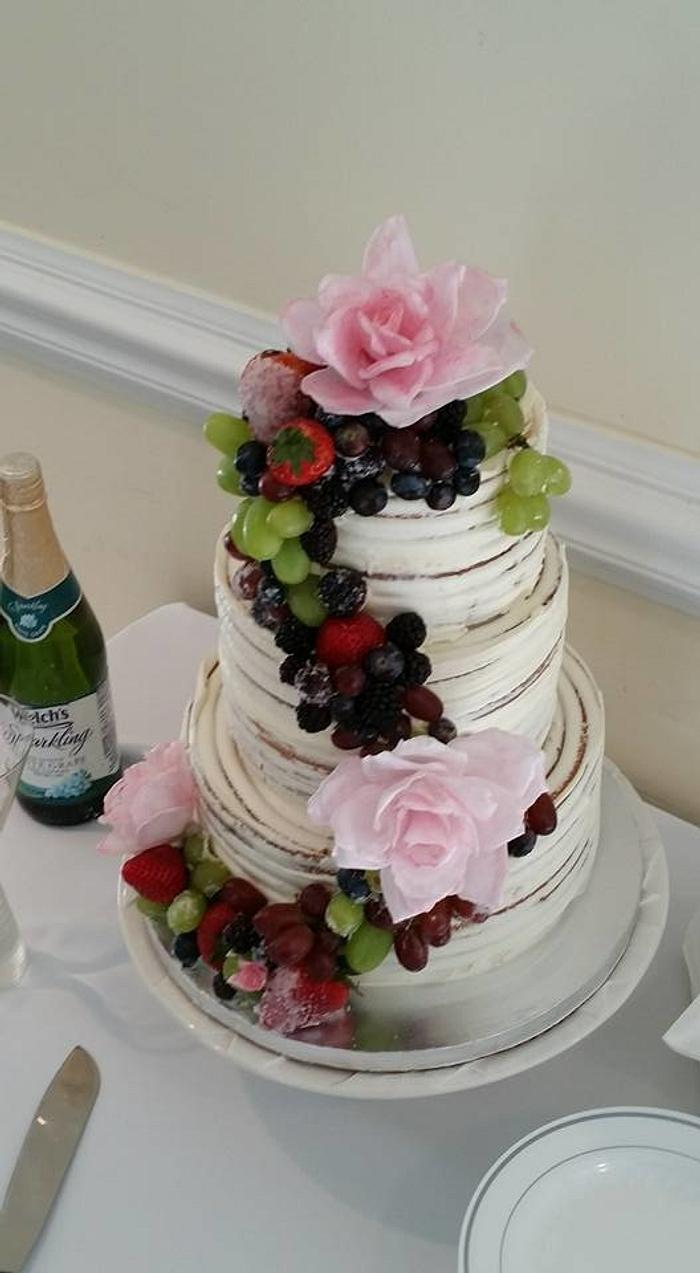 Cascading wafer paper roses and gold leaf wedding cake - - CakesDecor