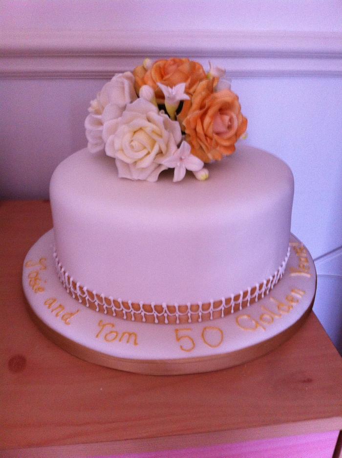 Golden wedding cake for Tom and Josie