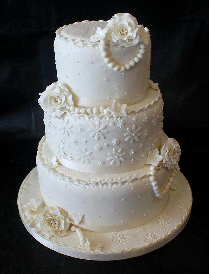 Three Tier Ivory Roses & Pearls Wedding Cake