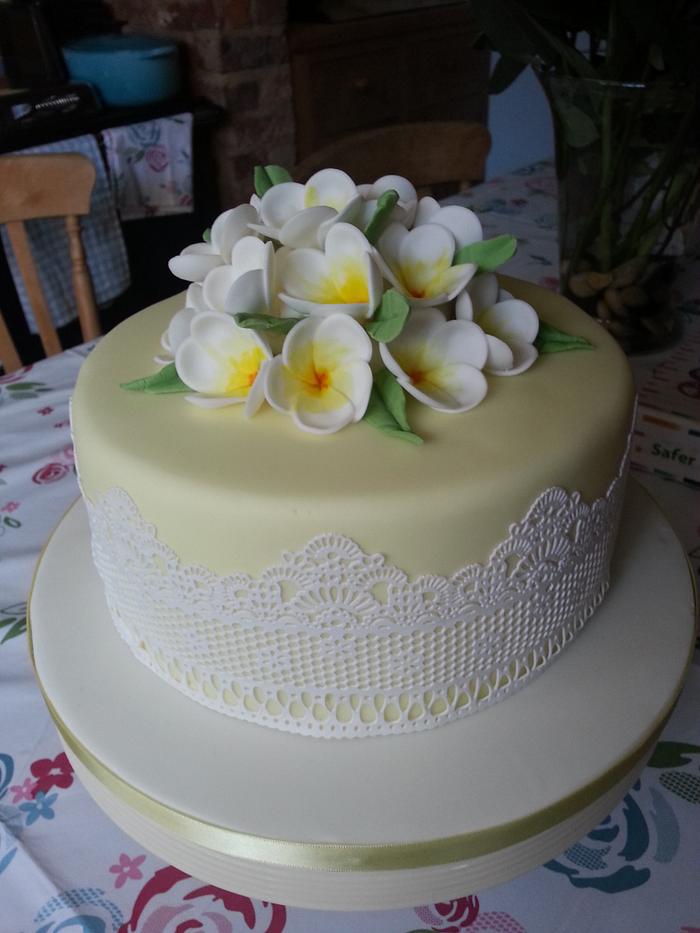 frangipani cake with cake lace