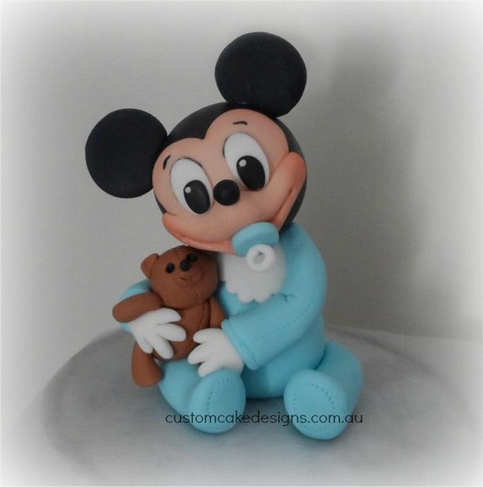 Baby Mickey hugging Teddy Topper