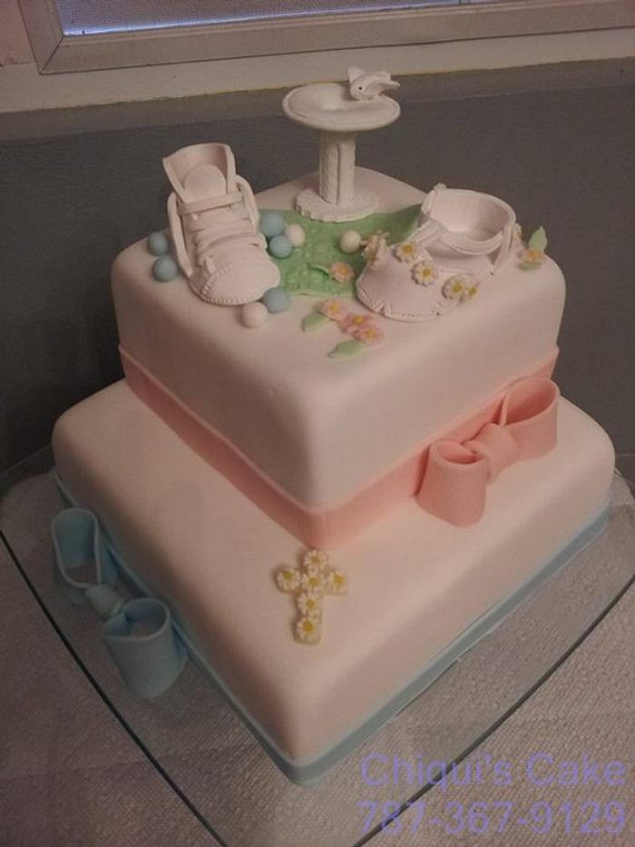 A baptism cake for a pair of babies