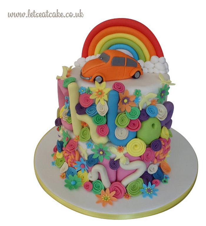 Flower Power Birthday Cake - with hancrafted edible beetle car and rainbow topper
