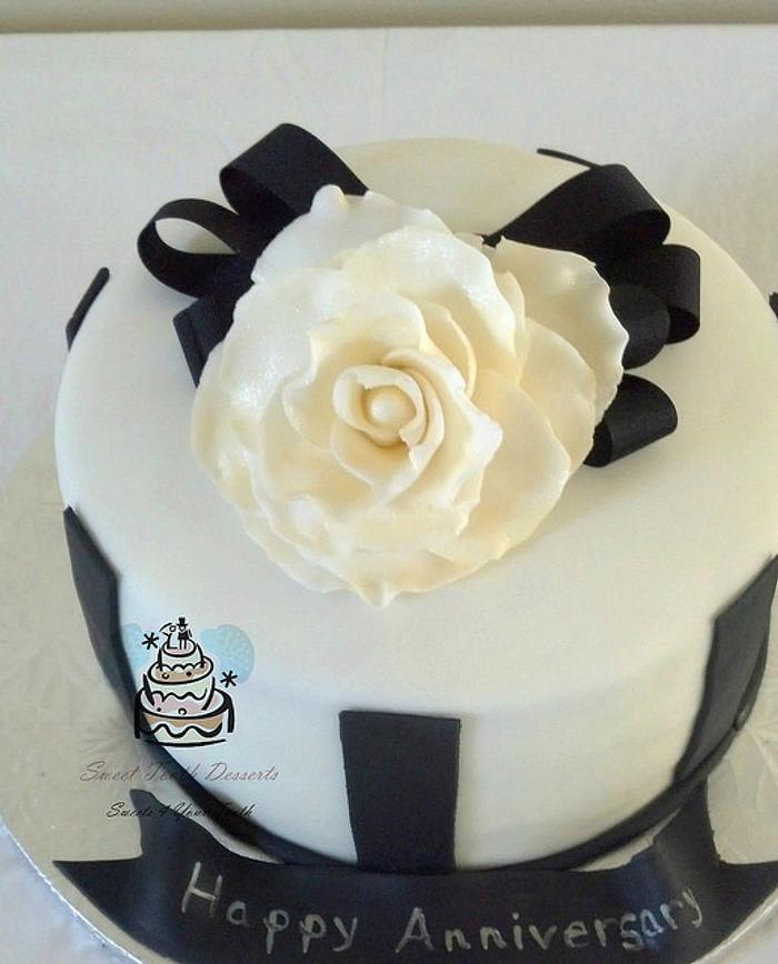 Black and Cream Wedding Anniversary Cake