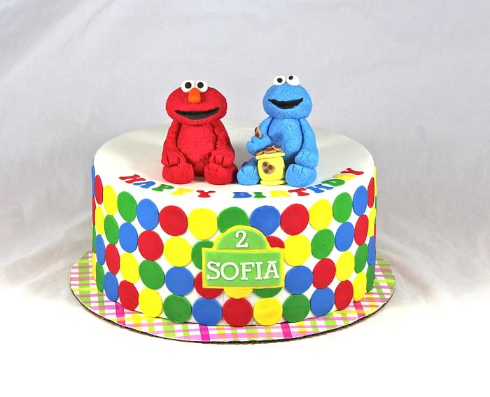 Elmo and cookie monster cake