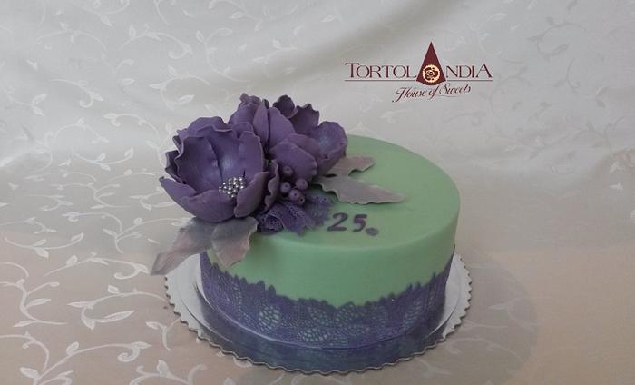 Birthday cake with purple sugar flowers