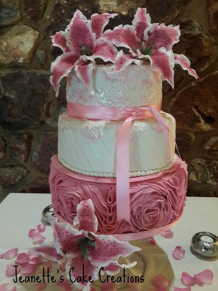 Stargazer lillies, ruffle rose and lace wedding cake for a friend of 38 years