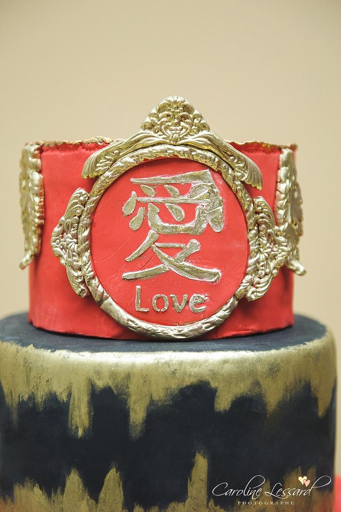 Red , black &  gold wedding cake  Diva of cake love 