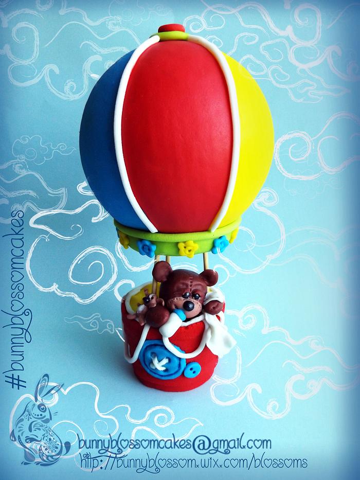 Baby bear in a hot-air-balloon topper