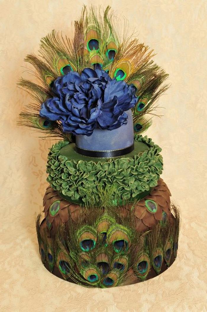 Peacock themed wedding cake.