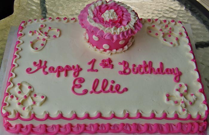 Pink buttercream cupcake 1st birthday cake.