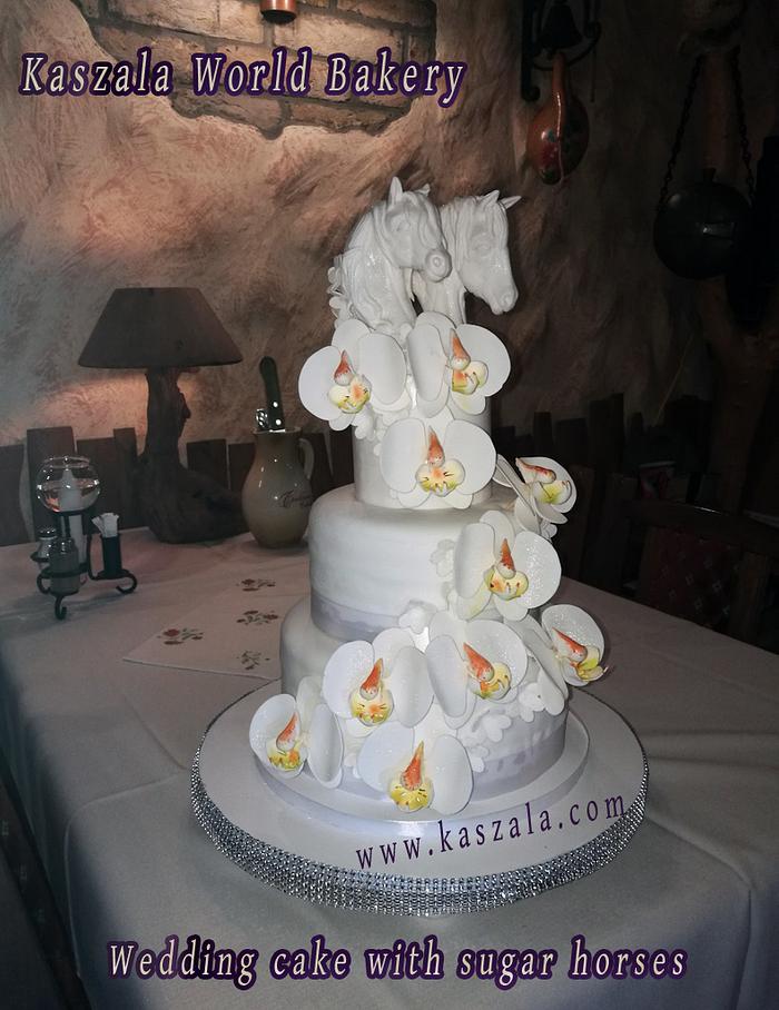 Wedding cake with sugar horses