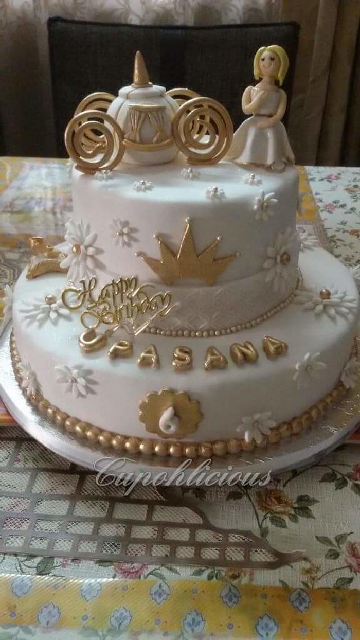 Gold and white cindrella themed chocolate cake 