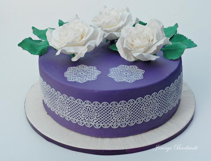 Birthday cake with white roses