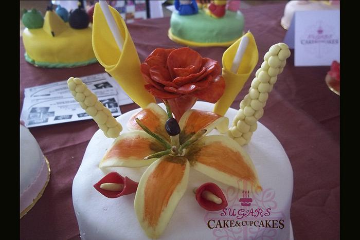 cake with bouquet of flowers
