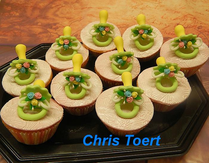 Cupcakes with a pacifiertopper