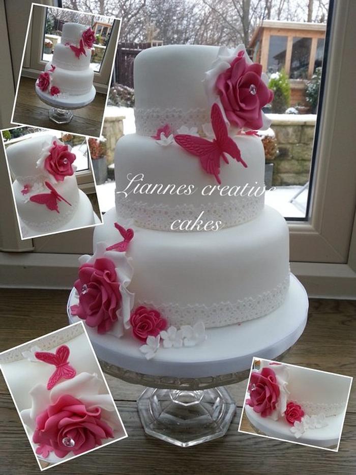 Hot pink and white butterfly and lace wedding cake x