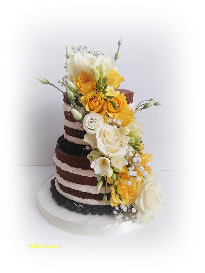 Naked cake with fresh flowers
