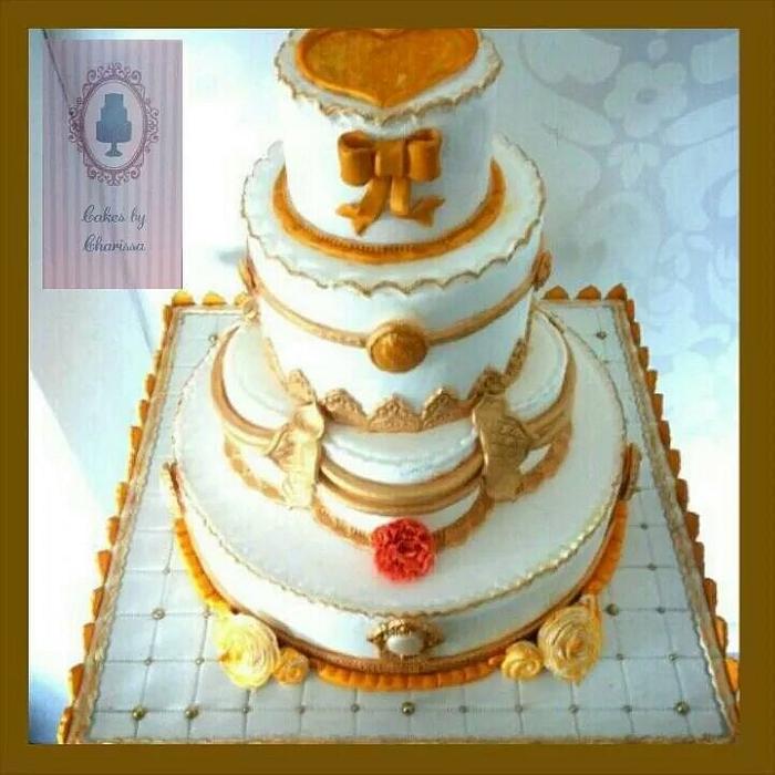 Gold & white wedding cake