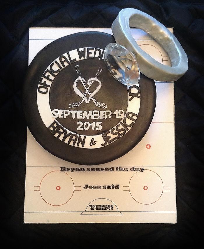 Hockey puck engagement cake 