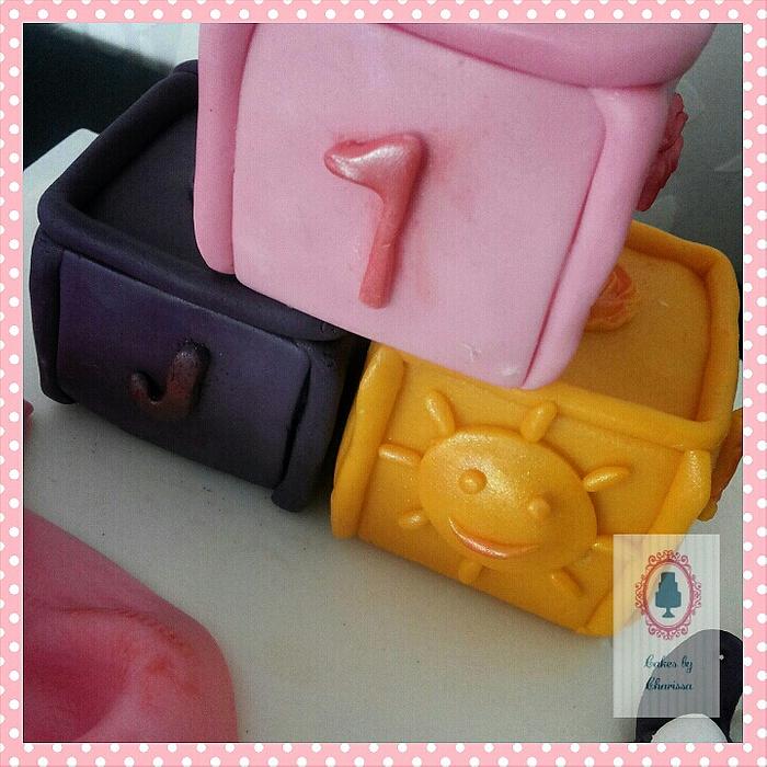 Baby blocks, blanket and pacifier
