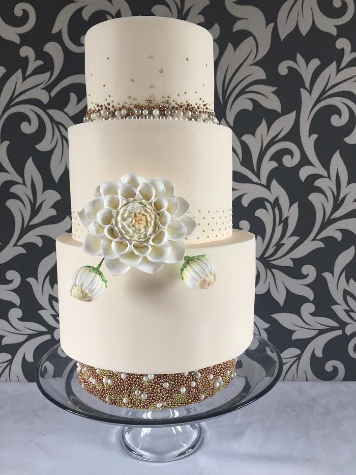Gold beaded wedding cake 