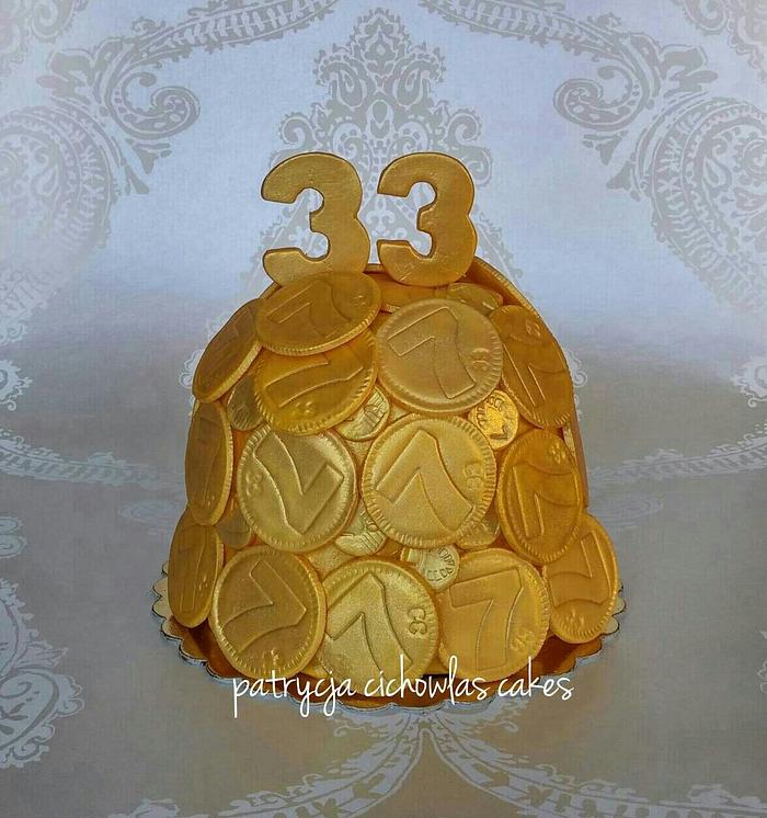 gold money cake with lucky number 7