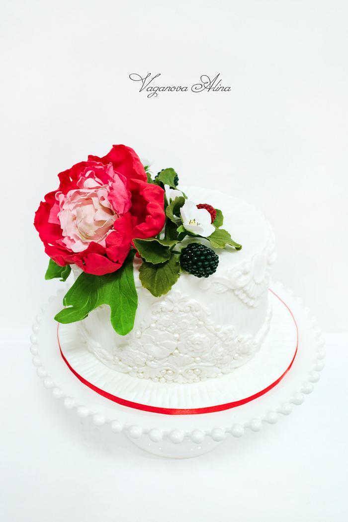 Anniversary cake with peony and blackberries