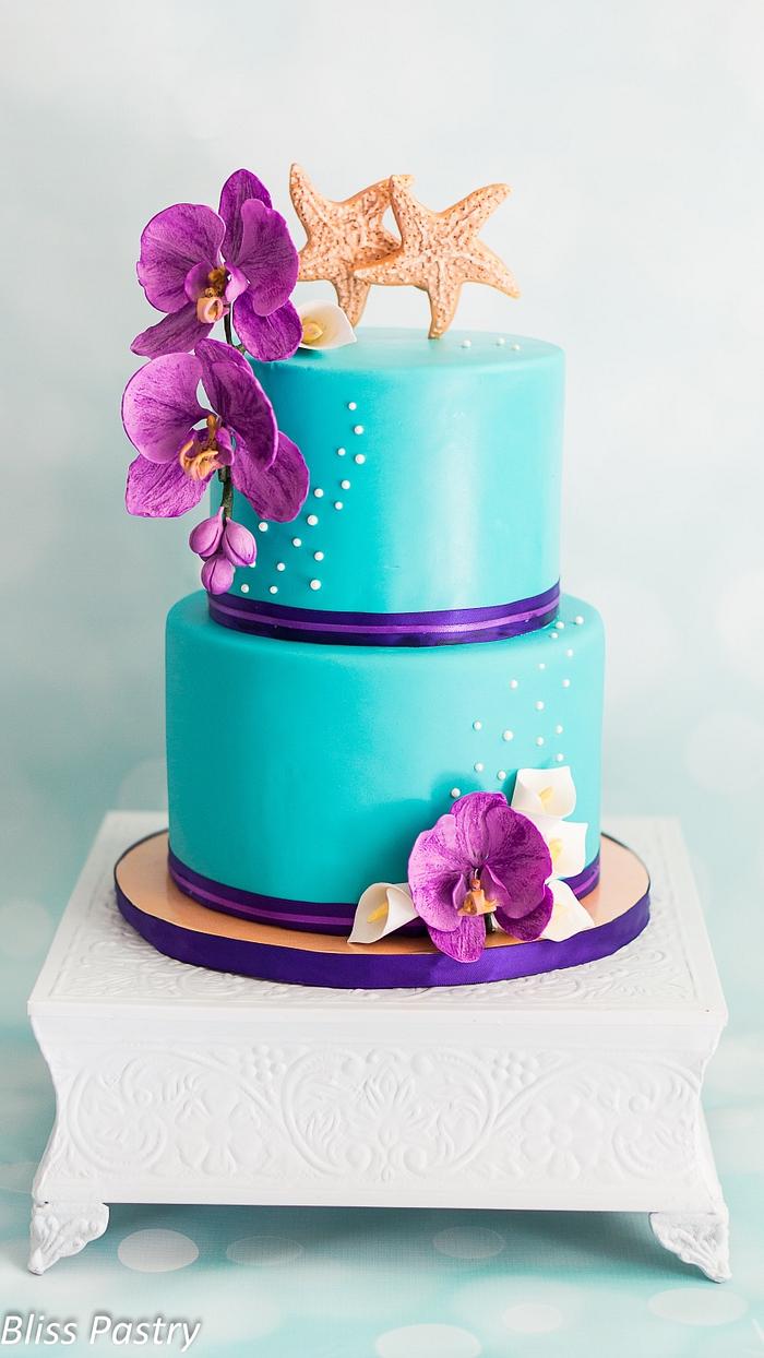 Teal and purple wedding cake