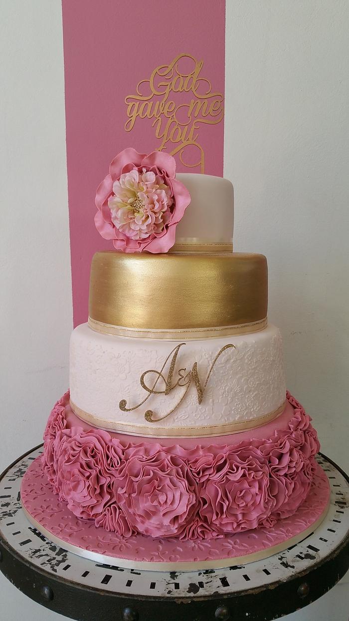 4 Tier gold and floral wedding cake