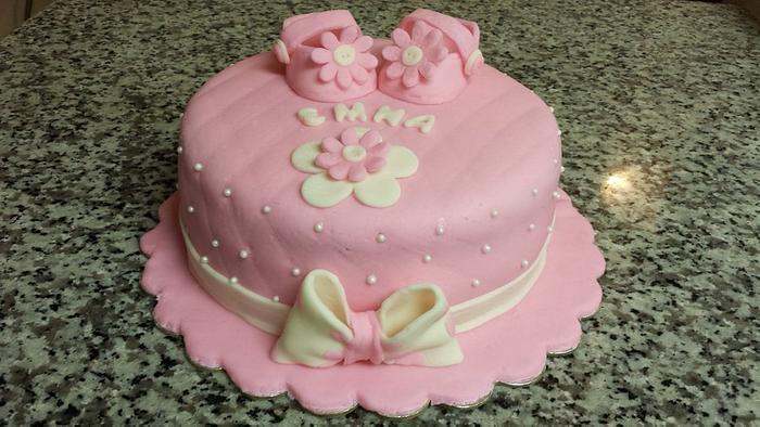 pink hat baby shoes cake 