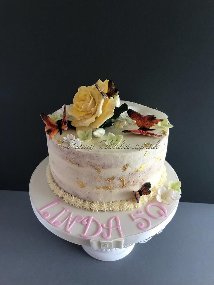 Butterflies and rose cake