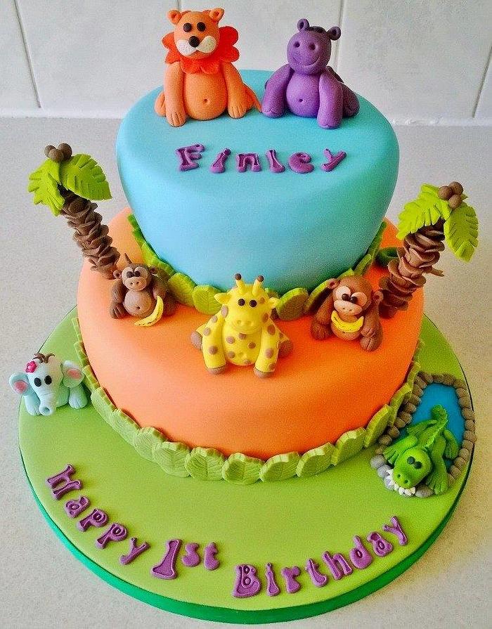 Jungle animal themed 2 tiered 1st birthday cake