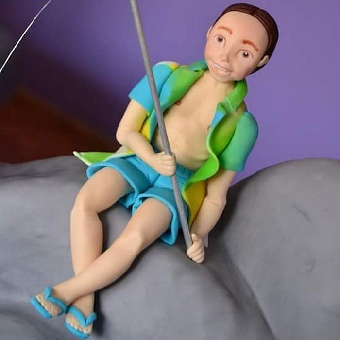 Fisherman figurine