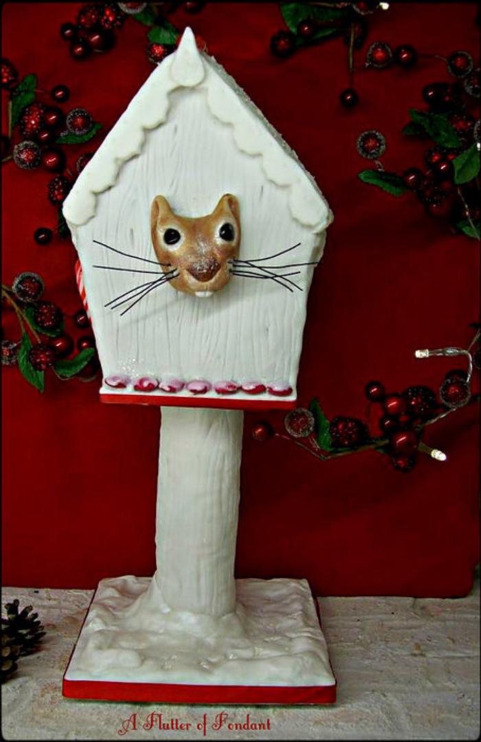 Cheeky Squirrel in Gingerbread Birdhouse