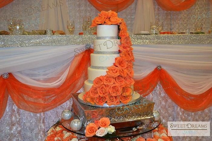 Orange roses wedding cake.