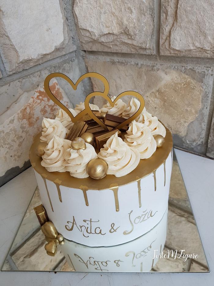 Gold white drip cake