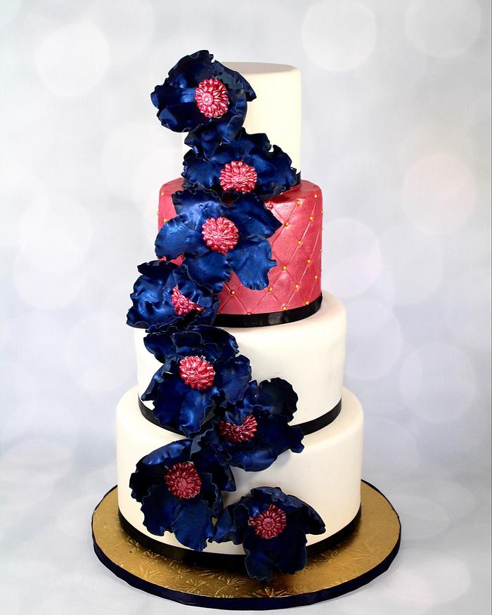 Coral and navy wedding cake