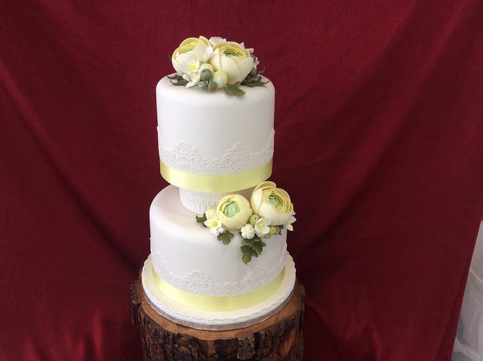 Yellow Renuculus flower wedding cake 