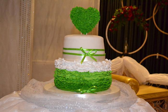 pretty green engagement cake