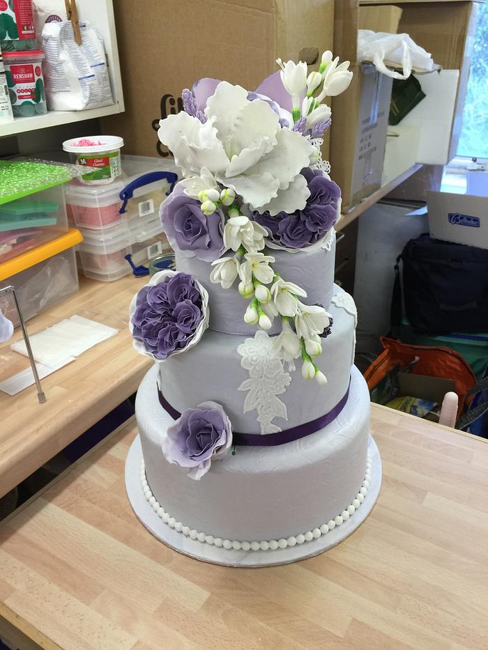 Purple and white bouquet cake